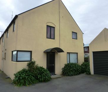 Fenced courtyard, garden and single garage with this two bedroom to... - Photo 3