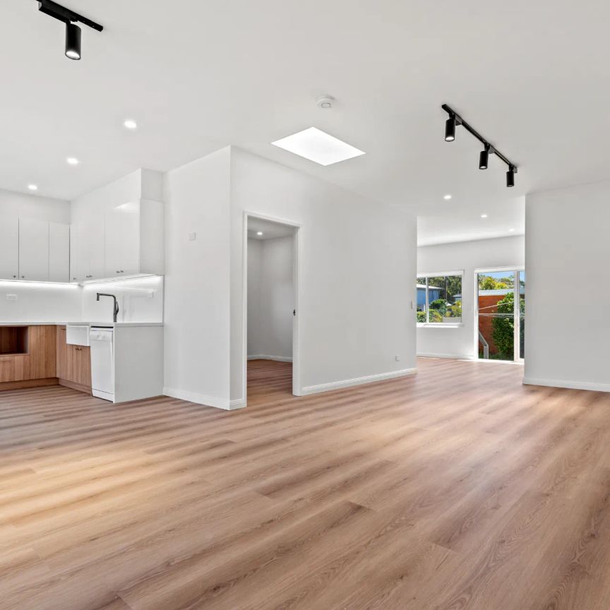 Immaculate Family Home - Freshly Renovated In Prime Location with Water Views - Photo 1