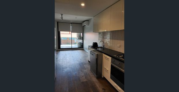 Partially Furnished Apartment - Photo 1