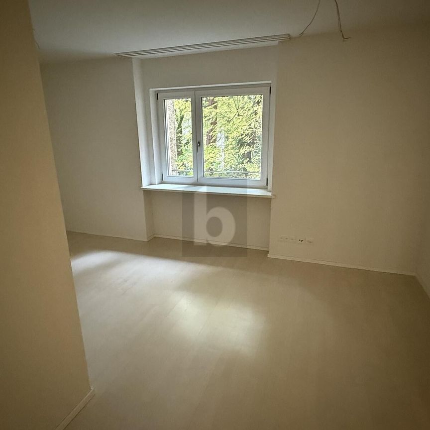 LIGHT, MODERN WITH BALCONY AND TOP KITCHEN - Photo 1