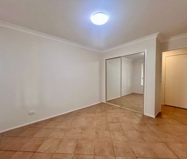 Neat and tidy 3 bedroom home with Split system air conditioning! - Photo 5