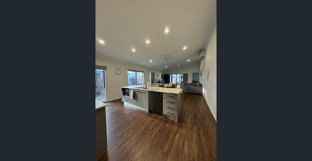 More Than Meets the Eye: 3 Bedrooms + 3 Living Spaces in Prime Shaw! - Photo 5