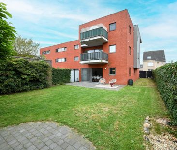 Mooi gelijkvloers appartement met ruime tuin en parking - Foto 6