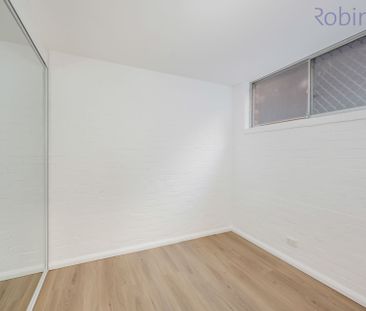 Renovated two bedroom unit with undercover parking for one vehicle - Photo 4