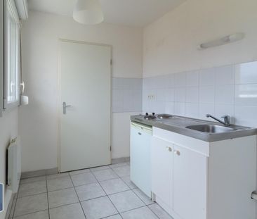 Location Appartement 2 pièces 47m² LE CATEAU CAMBRESIS 59360 - Photo 2