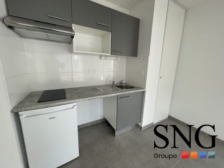 T2 AVEC LOGGIA ET UN PARKING INTERIEUR - Photo 4