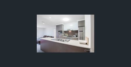 3-Bedroom Modern Townhouse Backing onto Parkland in Secure Estate - Photo 2