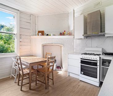 Three-bedroom home reveals modern updates - Photo 6