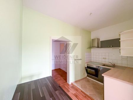 Tolle 2-Raum-Wohnung mit Balkon, Einbauküche & Dusche im Ostviertel von Gera! - Photo 5