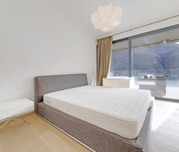 ELEGANTE APPARTAMENTO DI 4.5 LOCALI CON GIARDINO E VISTA LAGO - Photo 4