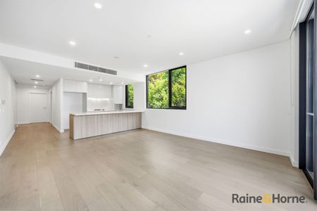 Near- New Modern 2 Bedroom Apartment in the Heart of Rouse Hill - Photo 2