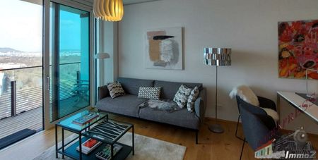 Herrlicher Blick über Wien! - Moderne, komplett eingerichtete 2-Zimmer Wohnung im Triiiple Tower mit großer Terrasse (9m²) wartet! - Photo 2