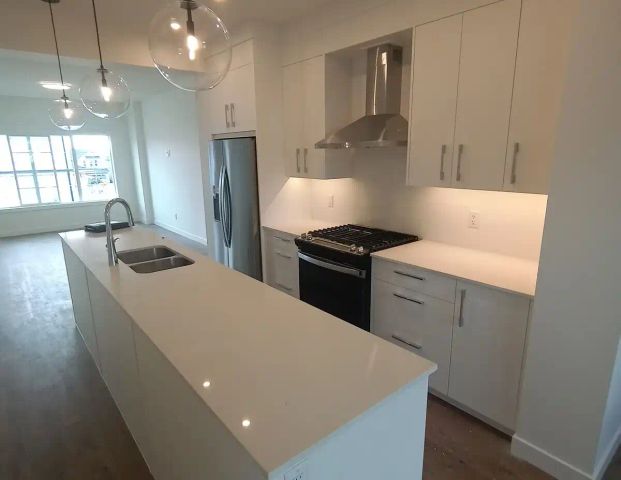 NEW PRICE! EXPANSIVE OPEN-CONCEPT 3BR+ UPPER DUPLEX w/2 CAR GARAGE, DECK & YARD — 3 Bedrooms+ Den Duplex - Photo 1