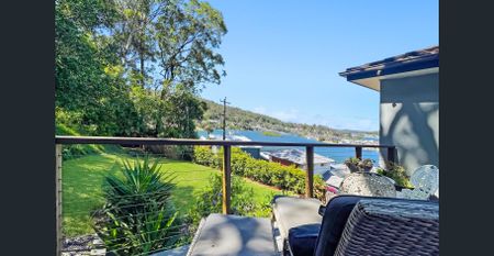 Furnished Coastal Retreat with Water Views & Modern Luxury - Photo 5