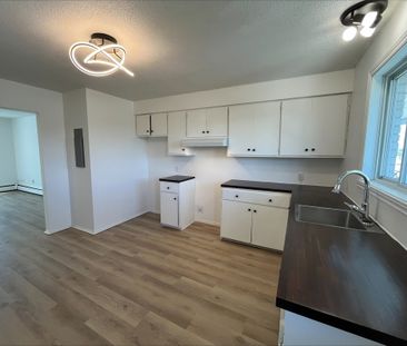 GRAND 4 ½|CHAUFFAGE ET EAU CHAUDE - Photo 1