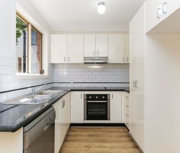 THREE BEDROOM FAMILY HOME - Photo 1