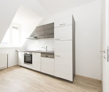 Ihr neuer Lieblingsplatz – Wohnung mit Balkon zum Innenhof und Einb... - Foto 1