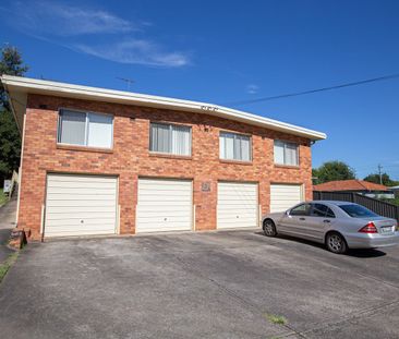 Two Bedroom Unit with Air Conditioner & Garage - Photo 2
