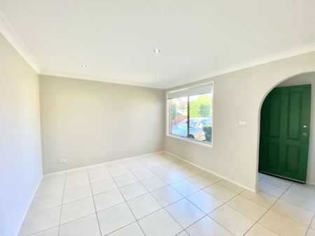 4 Arnold Avenue, Green Valley, NSW 2168 - Photo 2