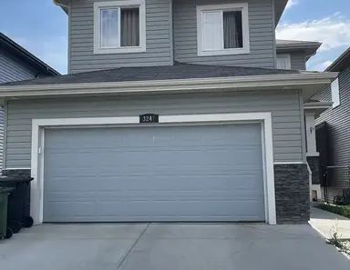 WALK OUT HOUSE, POND FACING BACK IN LAUREL CROSSING | 3247 17B Avenue Northwest, Edmonton - Photo 1