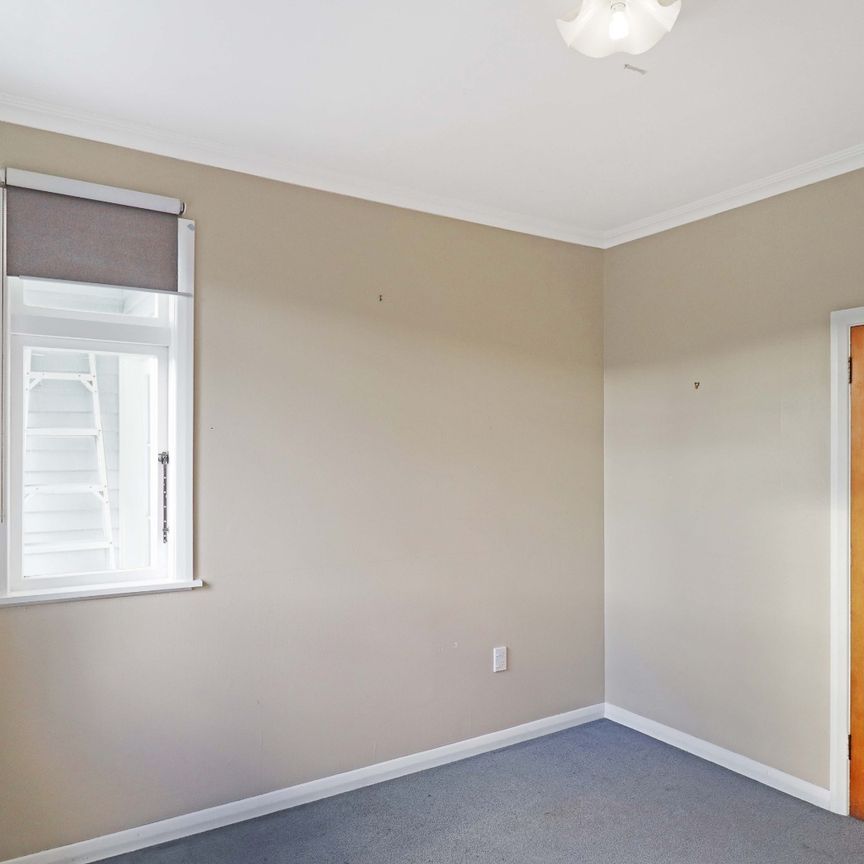 Sunny 3-Bedroom Home with Views in Island Bay - Photo 1