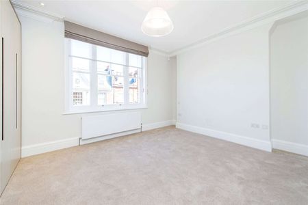 A modern 2 bedroom, 1 bathroom duplex on the third and fourth floors. - Photo 3