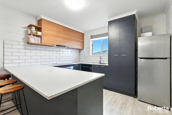 Modern Comfort in Prime Location - Photo 1
