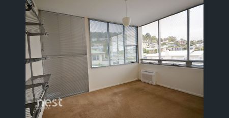 Stylish and Spacious 2-Bedroom Townhouse with Stunning Views -includes power - Photo 2