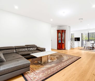 STYLISH MODERN FAMILY HOME IN A PRIME ROUSE HILL LOCATION - Photo 1