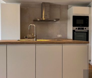 Appartement te huur in Kermt voor € 820 met 1 slaapkamer - Photo 1