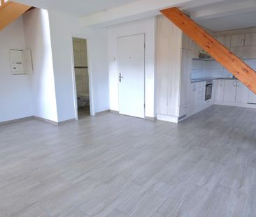 Rent a 2 ½ rooms duplex in Courchapoix - Photo 2