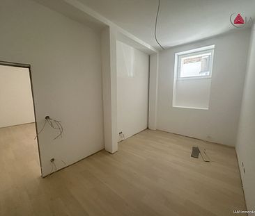 Erstbezug nach Kernsanierung: 2,5 -Zimmer-Wohnung im ruhigen Hinterhaus, zentral in Wiesbaden. - Photo 4