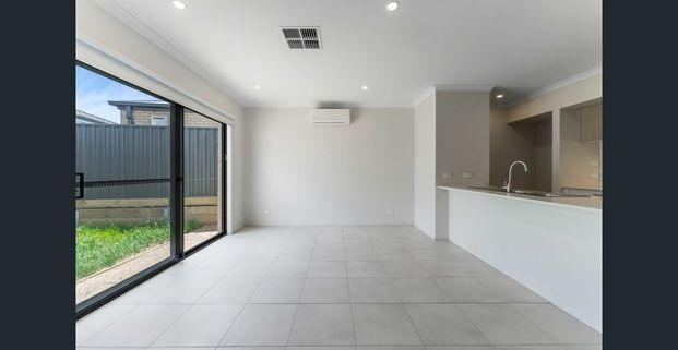 **RECEIVE ONE MONTH FREE RENT, ASK US HOW! Modern 3-Bedroom Home for Lease in Fraser Rise - Photo 1