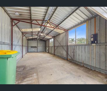 Neat, Updated Home with Large Driveway, Carport & Workshop - Photo 5