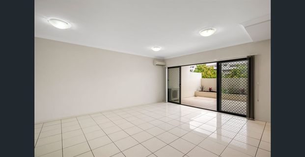 Suave Villa-Style Townhouse - Photo 1