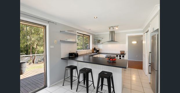 Sun-Drenched Family Living Backing onto National Park - Photo 1