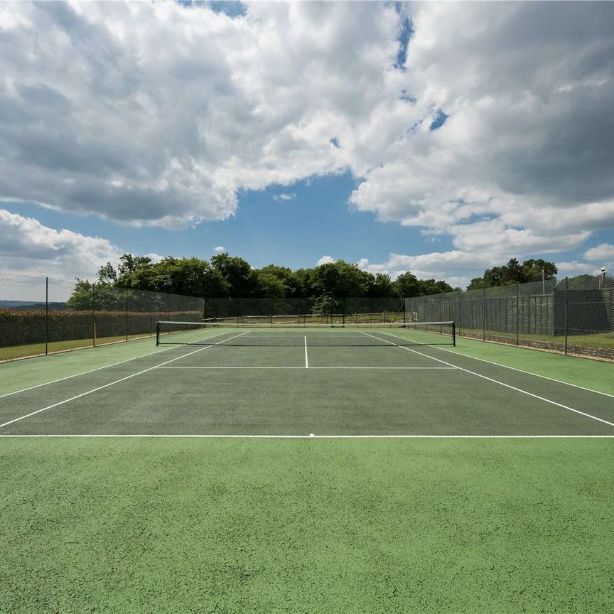 An extensively refurbished five bedroom country house with an indoor pool and tennis court in south Farnham under 2 miles from the centre of Farnham town. - Photo 1