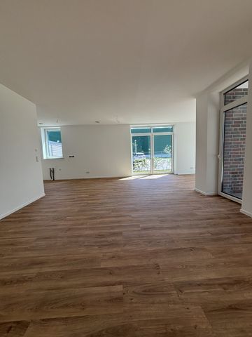 Sonnige Erdgeschosswohnung am Norder Tor mit großer Terrasse zur Miete! - Photo 2