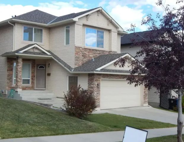 Beautifully renovated 3 Bedroom House Springbank Hill | 7256 26 Ave SW, Calgary - Photo 1