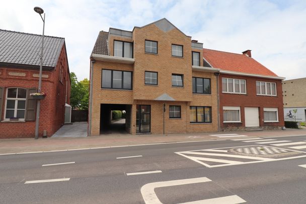 Een gelijkvloers appartement met 2 slaapkamers, tuin en garage. - Foto 1