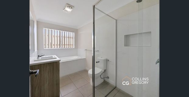 Four-Bedroom Home - Your Private Oasis in Deebing Heights Awaits - Photo 1