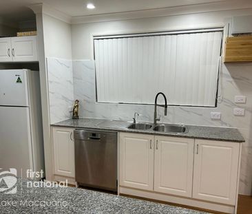 Charming and Spacious 4-Bedroom Home - Photo 1