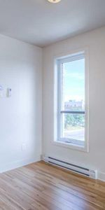 APPARTEMENT 4 1\2 + GRAND BALCON PRIVÉ + STATIONNEMENT - Photo 4