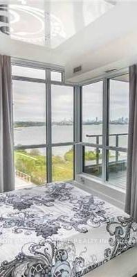 Feels brand new + den waterfront views parking included! - Photo 1