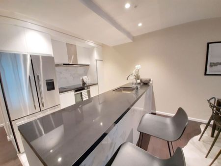 Double Level Apartment in Great Location - Photo 2