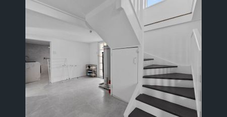 Beautifully RenovatedFamily Living with Dual-Living Flexibility - Photo 4