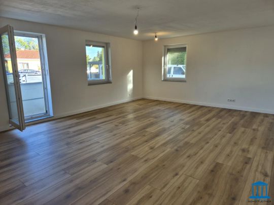 Terrassen-Wohnung im Erdgeschoss mit Einbauküche und bis zu zwei PKW-Abstellplätzen / Top 2 - Photo 1