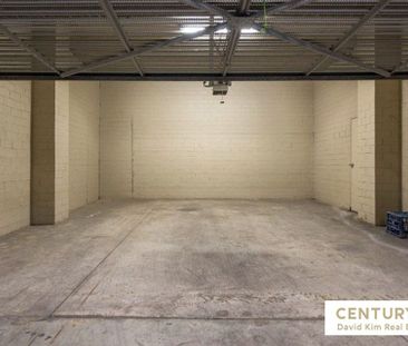 Secure & Bright Two Bedroom Townhouse with Double Garage - Photo 3