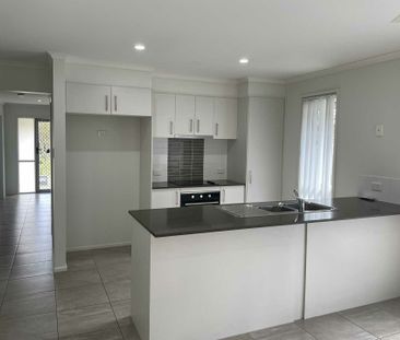 Spacious 4-Bed Family Home in Holmview | Air-Con & Modern Living - Photo 4