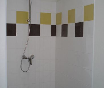 Location Appartement 4 pièces 80m² FONTENAY LE COMTE 85200 - Photo 6